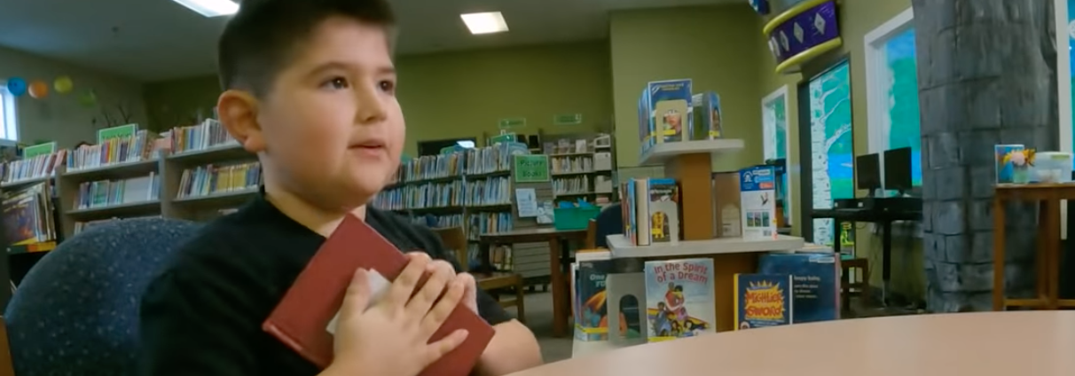 Kid Sneaks His Own Book Into Library