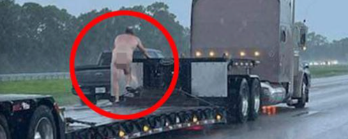 Naked Man Climbs on Truck!