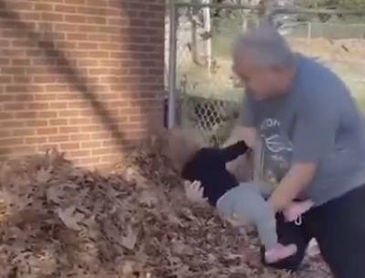 Baby Tossed In Leaves