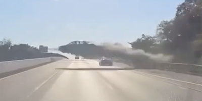 Car Jumps Over Traffic