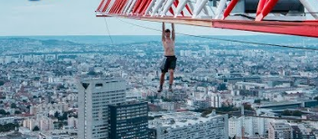 Man Dangles Above Paris