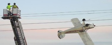 Plane Tangled in Power Lines