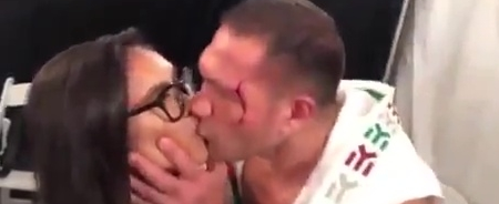 Boxer Kisses Reporter