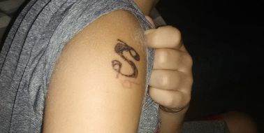 9-Year-Old Gets Tattoo