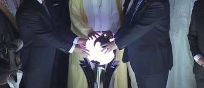 Trump Touches Glowing Orb